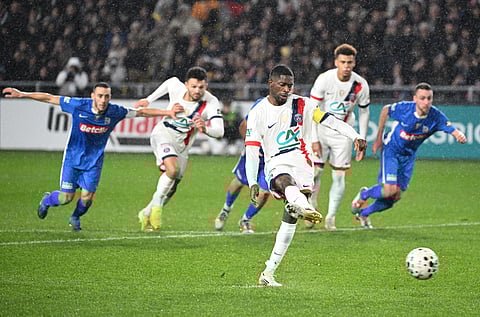 PSG's forward Ousmane Dembele scores from the penalty spot during the French Cup round of 64 football match between Fontenay-le-Comte and PSG at La Beaujoire stadium, in Nantes, western France, on December 20, 2025.