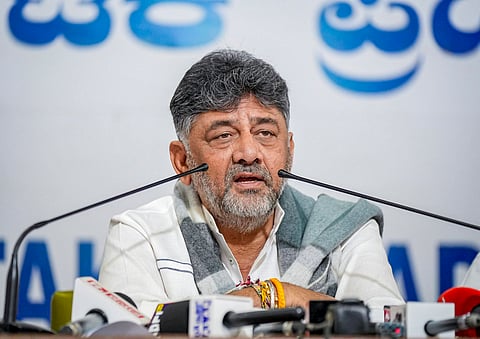 Karnataka Deputy Chief Minister DK Shivakumar addresses a press conference, in Bengaluru.