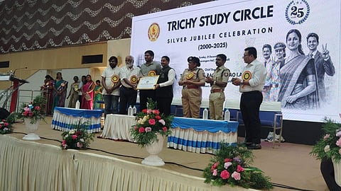 Tiruchy Collector V Saravanan felicitating Suresh Kumar, founder, Tiruchy study circle