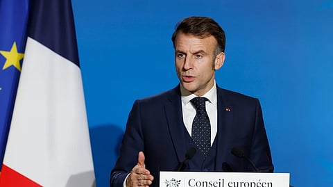 French President Emmanuel Macron speaks during a media conference at the EU Summit in Brussels, Friday, Dec. 19, 2025.
