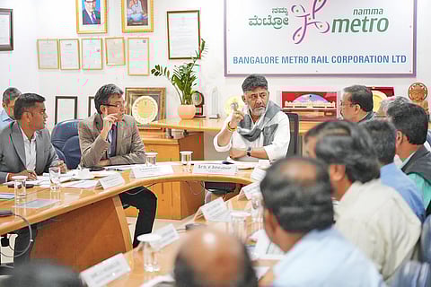 DCM DK Shivakumar and other senior officials review the progress of the Bangalore Metro Rail project, in Bengaluru on Monday.