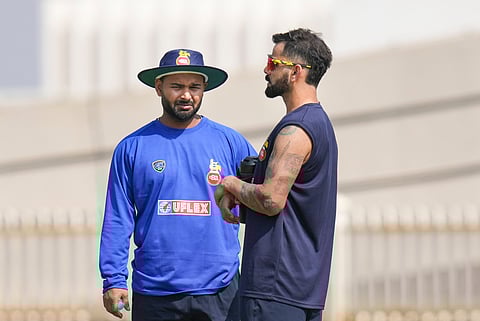 Rishabh Pant (L) and Virat Kohli during a training session in Bengaluru on Tuesday