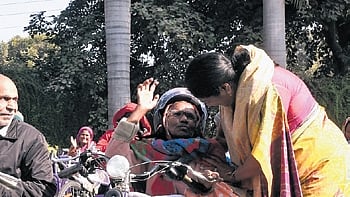 Delhi CM Rekha Gupta during a visit at a hospital in New Delhi on Wednesday.