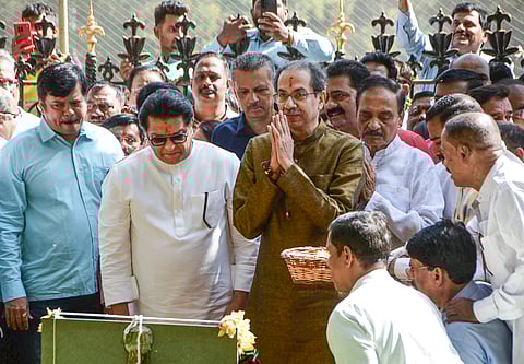MNS chief Raj Thackeray and Shiv Sena (UBT) chief Uddhav Thackeray pay tributes at the memorial of Shiv Sena founder Bal Thackeray at Shivaji Park ahead of their alliance announcement.