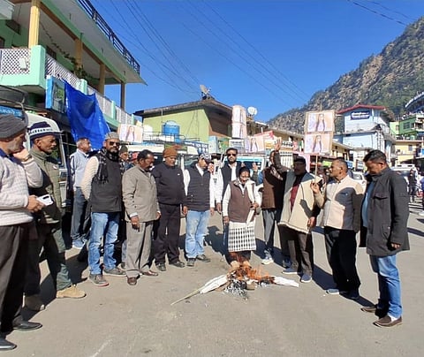 Congress workers stage protest in Rudraprayag, burn effigy of the ruling BJP government in Uttarakhand.