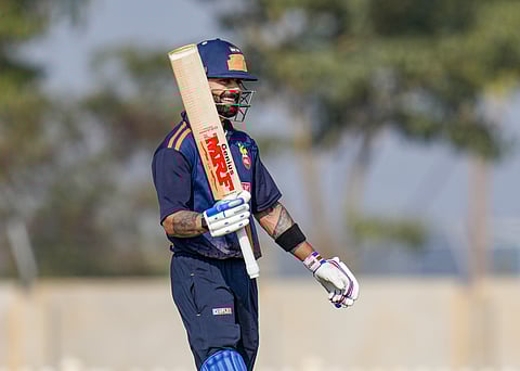 Virat Kohli celebrates his hundred on Wednesday