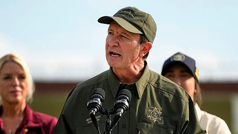 FILE - Louisiana Gov. Jeff Landry speaks to reporters at the Louisiana State Penitentiary in Angola, La., Sept. 3, 2025.