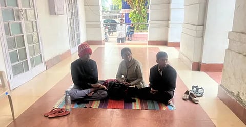 Deputy collector Mamtaj Moharana staged dharna with her two sons in front of the collector’s office at Baripada on Wednesday 