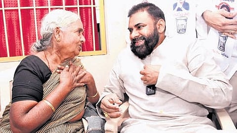 Deputy Chief Minister Pawan Kalyan with Indla Nageswaramma at her residence in Ippatam village of Guntur district on Wednesday.