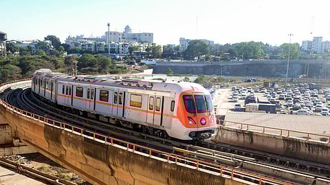 A metro train runs on a track ahead of its launch in Bhopal, Madhya Pradesh.