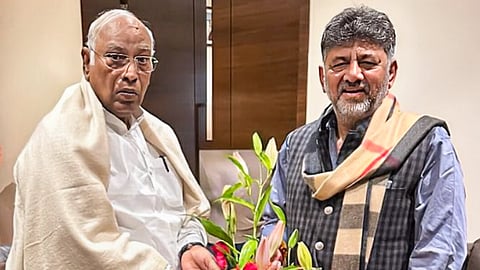 Karnataka Deputy Chief Minister DK Shivakumar meets AICC President Mallikarjun Kharge at his residence, in Bengaluru.