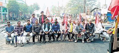 Agitators blocking a road during the bandh in Chandbali on Thursday