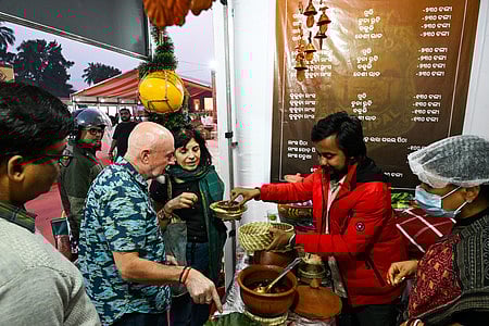 File | People thronged to eat traditional delicacies at Odisha Khadya Mahotsav