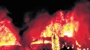  Five people were burnt alive including the driver of truck when a truck hit a private bus resulting in both bus and truck catching fire at Gorlattu in Hiriyur of Chitradurga district in the early hours of Thursday.