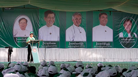 Thaung Aye, a candidate of the military-backed Union Solidarity and Development Party (USDP), speaks during an election campaign in Pyawbwe Township, Mandalay Division, central Myanmar, Thursday, Dec. 25, 2025.
