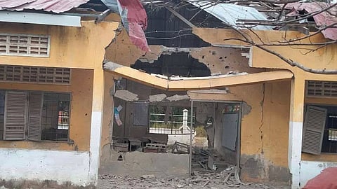 In this photo released by Agence Kampuchea Press (AKP), a damaged school is seen after a Thai bombing in Serei Sophaon, a provincial town of Banteay Meanchey Province, Cambodia, Thursday, Dec. 18, 2025.