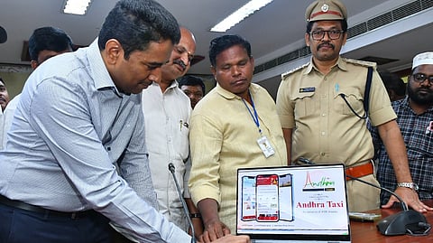 NTR district collector G Lakshmisha launches Andhra Taxi on Thursday.