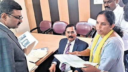 Upa Lokayukta Justice B Veerappa (seated) questions officials of a GP in Srinivasapura taluk of Kolar district