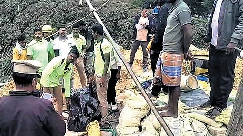 Rescue services personnel recovered the bodies of the workers killed during the digging of a well in Kotagiri on Friday 