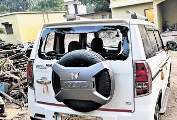 The vehicle of the Forest Department damaged in the attack.