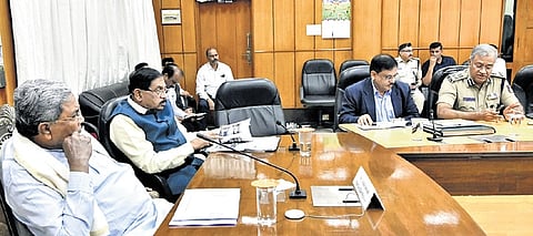 Chief Minister Siddaramaiah in discussion with Police Commissioner Seemanth Kumar Singh and others at a meeting in Bengaluru, on Monday | Express