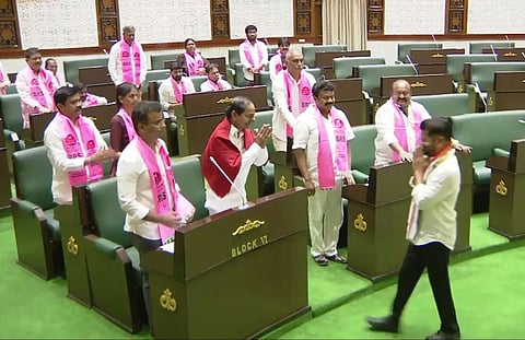 CM Revanth Reddy greeting leader of opposition K Chandrasekhar rao during the Assembly session in Hyderabad on Monday.