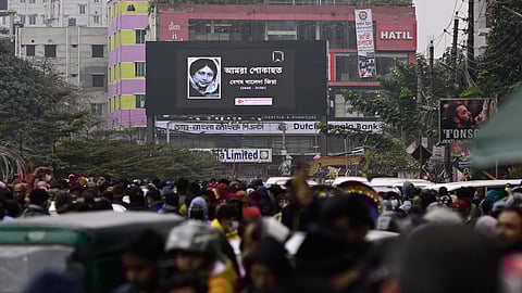 A portrait of former Bangladeshi Prime Minister Khaleda Zia is displayed on a digital screen near the hospital where she died, in Dhaka, Bangladesh, Monday, Dec. 30, 2025.