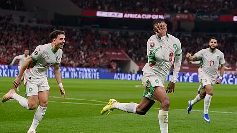 Morocco's Ayoub El Kaabi celebrates after scoring his side's first goal during the Africa Cup of Nations group A soccer match between Zambia and Morocco in Rabat, Morocco, Monday, Dec. 29, 2025.