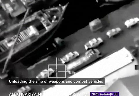 This frame grab from a video broadcast by Saudi state television on Tuesday, Dec. 30, 2025, shows what the kingdom describes as a shipment of weapons and armored vehicles coming from the United Arab Emirates at Mukalla, Yemen.