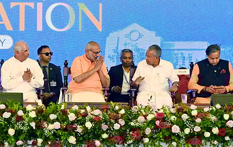 Vice President CP Radhakrishnan greeting Chief Minister Pinarayi Vijayan at the 75th anniversary closing ceremony of Mar Ivanios College here on Tuesday. Governor Rajendra Viswanath Arlekar and Thiruvananthapuram MP Shashi Tharoor is also seen./