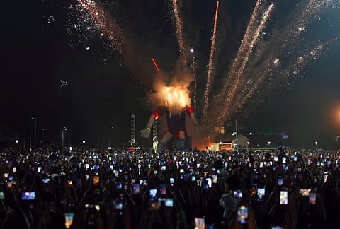  A 55-foot-tall effigy of ‘Pappanji’ is set on fire as part of the New Year celebrations at Veli ground in Fort Kochi, organised by Gala de Fort on Wednesday night