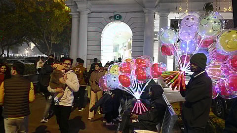 Heavy rush at Connaught Place on the eve of New Year in New Delhi on Wednesday.