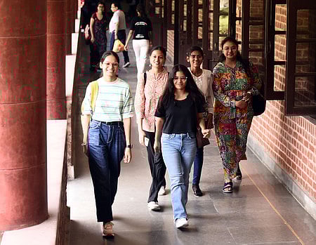 The first year students enjoy on the first day of the new academic session, at Miranda House College, North Campus