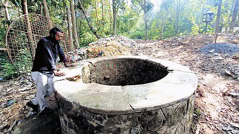 Rahul Kochuraman, the great-grandson of Ayyankali, at the recently revived 
140-year-old well at Mukkola near Venganoor in Thiruvananthapuram 