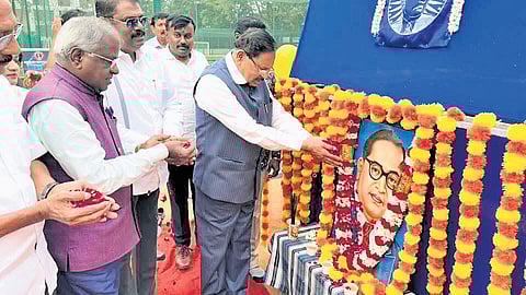 Home Minister Dr G Parameshwara and Dalit leaders offer tributes to Dr BR Ambedkar at an event to mark the Mahar victory in Bhima Koregaon, in Bengaluru on Thursday 
