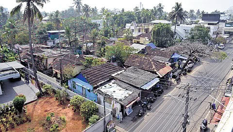An aerial view of the houses near Konthuruthy canal 