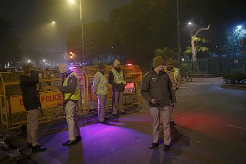 olice and security personnel stand guard on New Years on a cold winter evening, at Connaught Place, in New Delhi, Wednesday, Dec. 31, 2025.