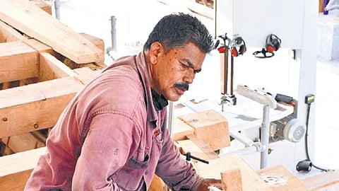 Babu Sankaran during the construction of INSV Kaundinya (right)