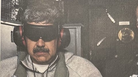 The Venezuelan leader had on what appeared to be noise-canceling ear muffs and grey Nike-branded sweatpants and jacket.
