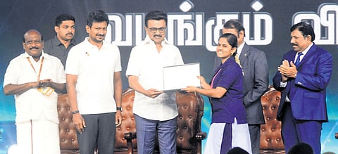 Chief Minister MK Stalin distributes free laptops to college students under the ‘Ulagam Ungal Kaiyil’ scheme at the Chennai Trade Centre on Monday 
