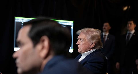 In this photo released by the White House, President Donald Trump monitors U.S. military operations in Venezuela, with Secretary of State Marco Rubio at Mar-a-Lago in Palm Beach, Fla., Saturday, Jan. 3, 2026.