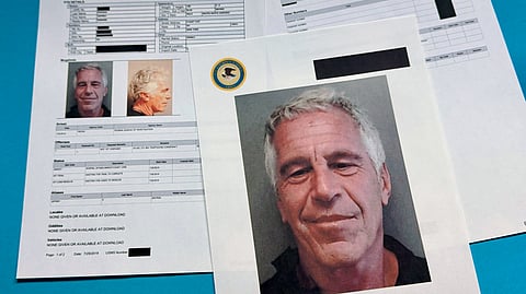 Documents that were included in the U.S. Department of Justice release of the Jeffrey Epstein files are photographed Friday, Jan. 2, 2026.