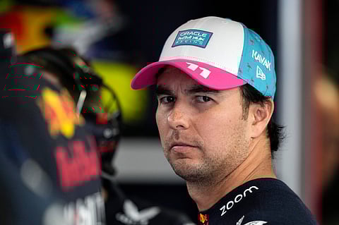 Red Bull driver Sergio Perez (11) waits for the Formula One Miami Grand Prix auto race to begin at the Miami International Autodrome.