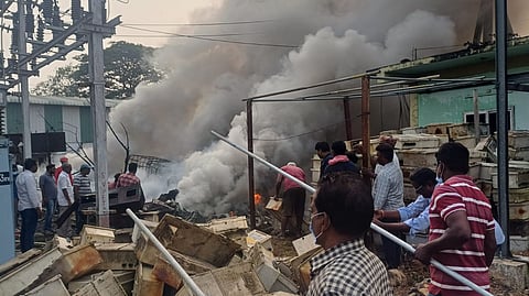 Electricity department officials and fire service personnel at the site after a fire broke out during maintenance work at the Vatluru electrical substation