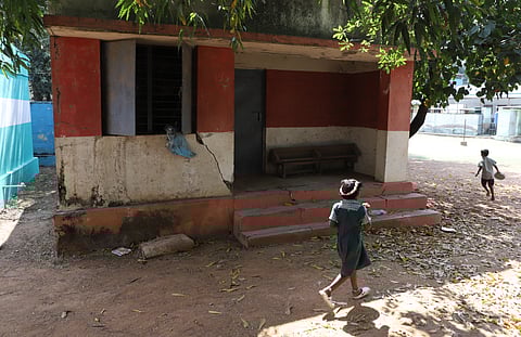 The dilapidated compound wall and a building on the premises of the Panchayat Union Middle School at Kasthurinaickenpalayam, on the outskirts of the city.