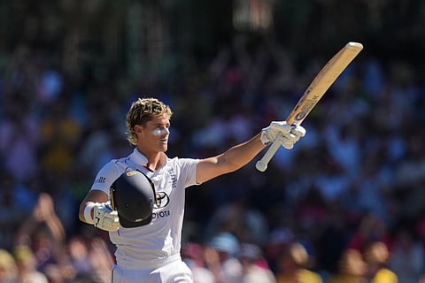 England's Jacob Bethell celebrates after scoring a century during play on day four of the fifth and final Ashes cricket test between England and Australia in Sydney, Wednesday, Jan. 7, 2026. 