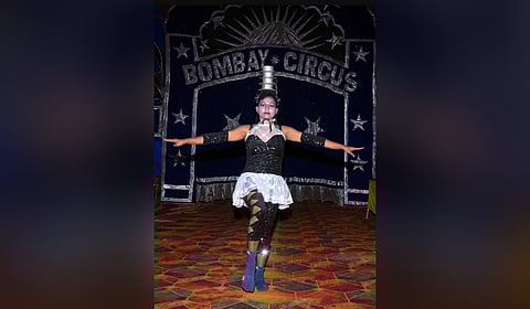 Baby, a resident of Thalassery, performing in the trapeze section of the Bombay Circus at Manappattiparambu 
in Kochi.