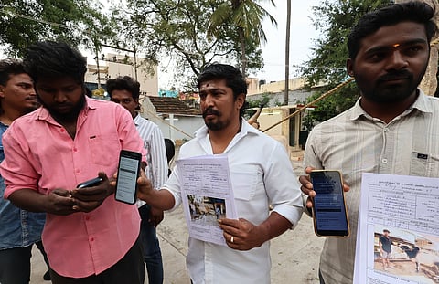 The bull owners and tammersrs are seen registering their names online to participate in the jallikattu in Madurai.