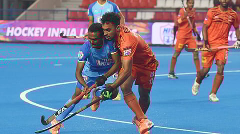 Action from the match between HIL GC and Shrachi Bengal Tigers