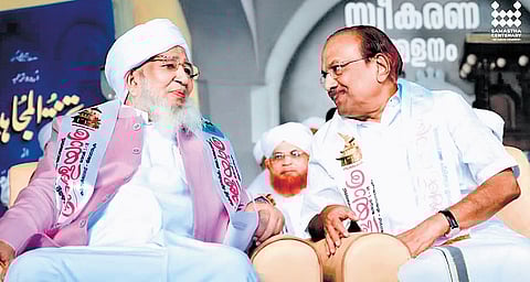 Kanthapuram A P Aboobacker Musaliyar with IUML leader P K Kunhalikutty at the reception accorded to the Kerala Yathra in Tirur, Malappuram, on Thursday